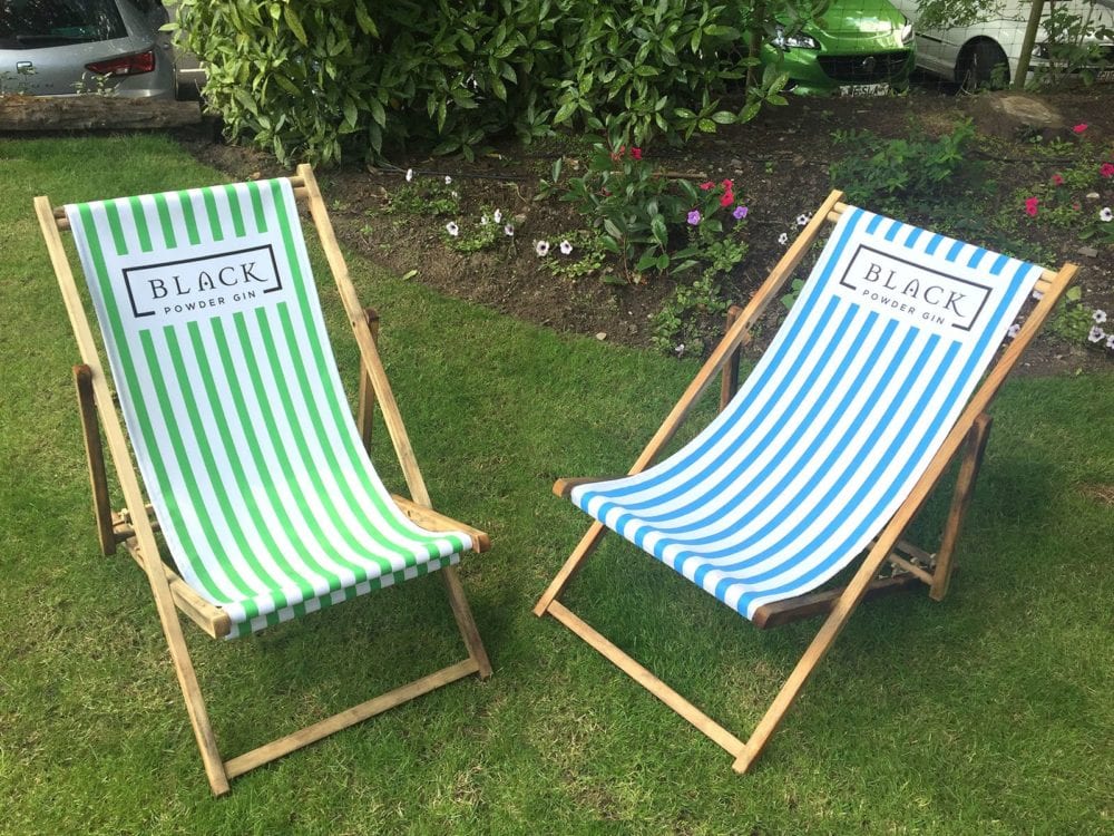 Pair of printed deckchairs